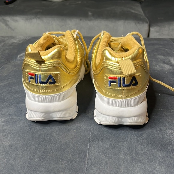 Metallic gold Filas with white trim - Picture 3 of 3